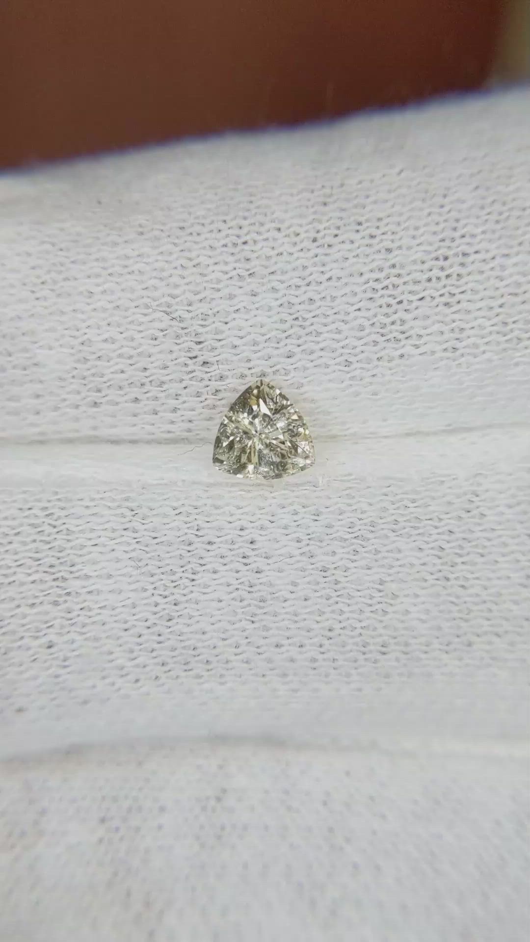 0.51 Ct. Peach Sapphire from Ceylon (Sri Lanka) Size Video