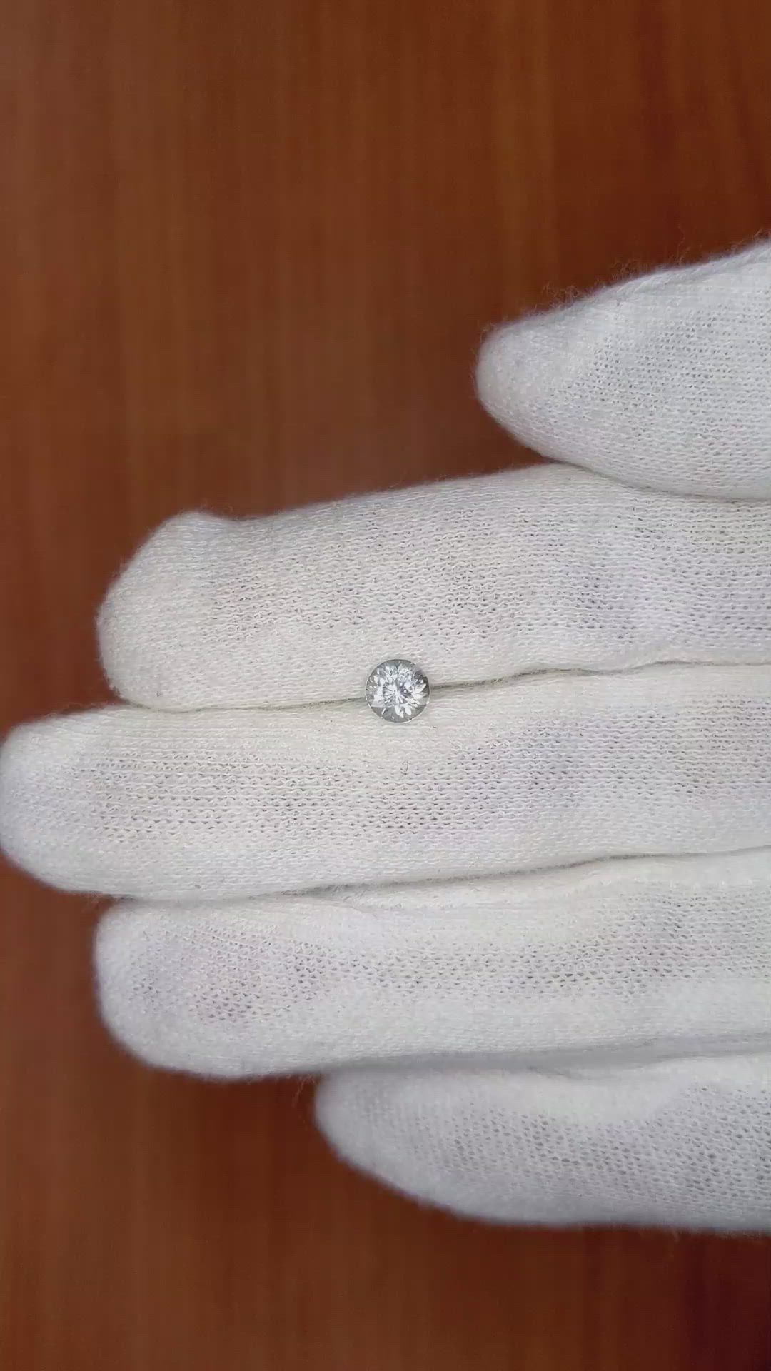 0.62 Ct. Bluish Green Sapphire from Montana Size Video