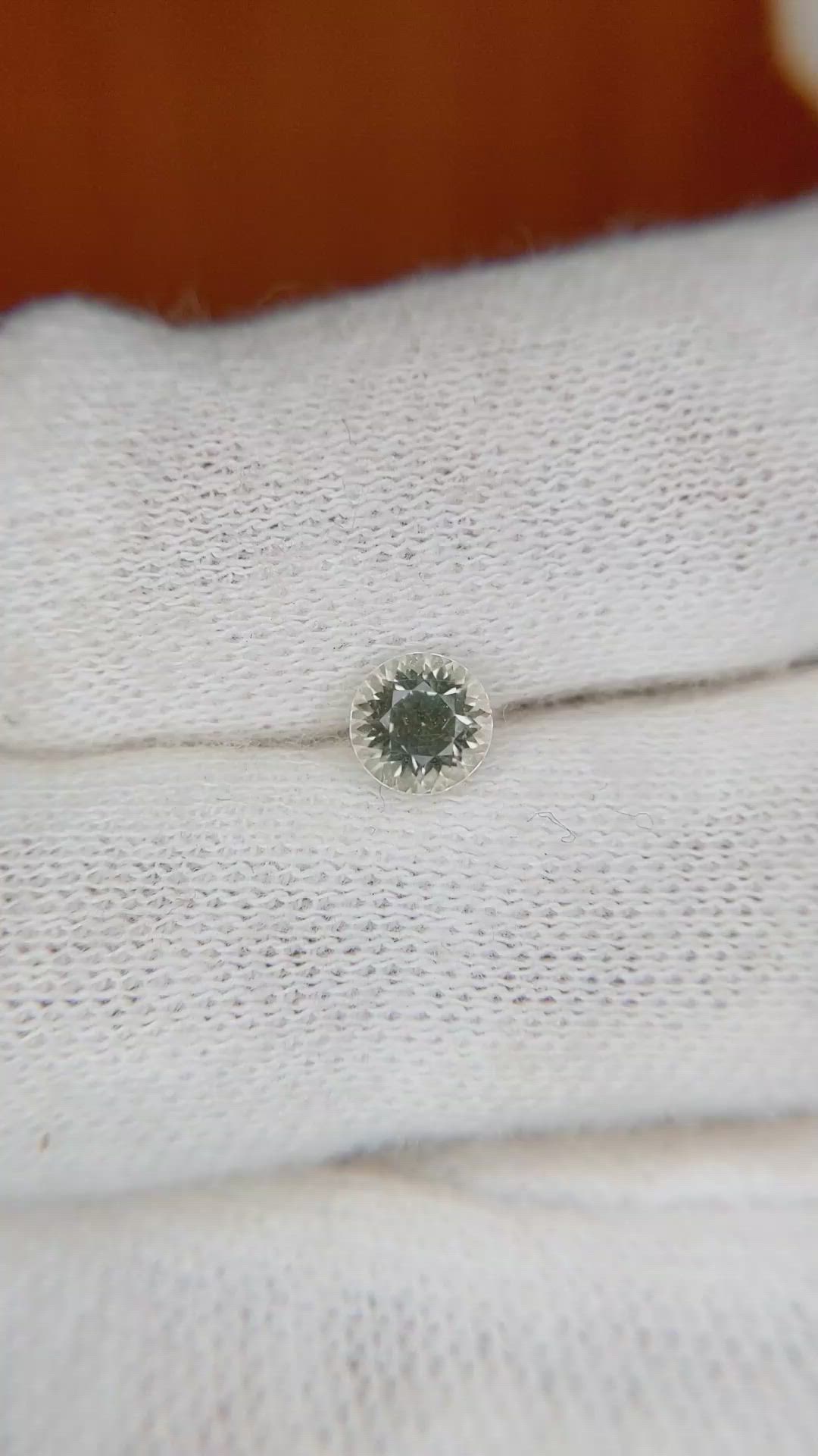 0.66 Ct. Greenish Brown Sapphire from Montana Size Video