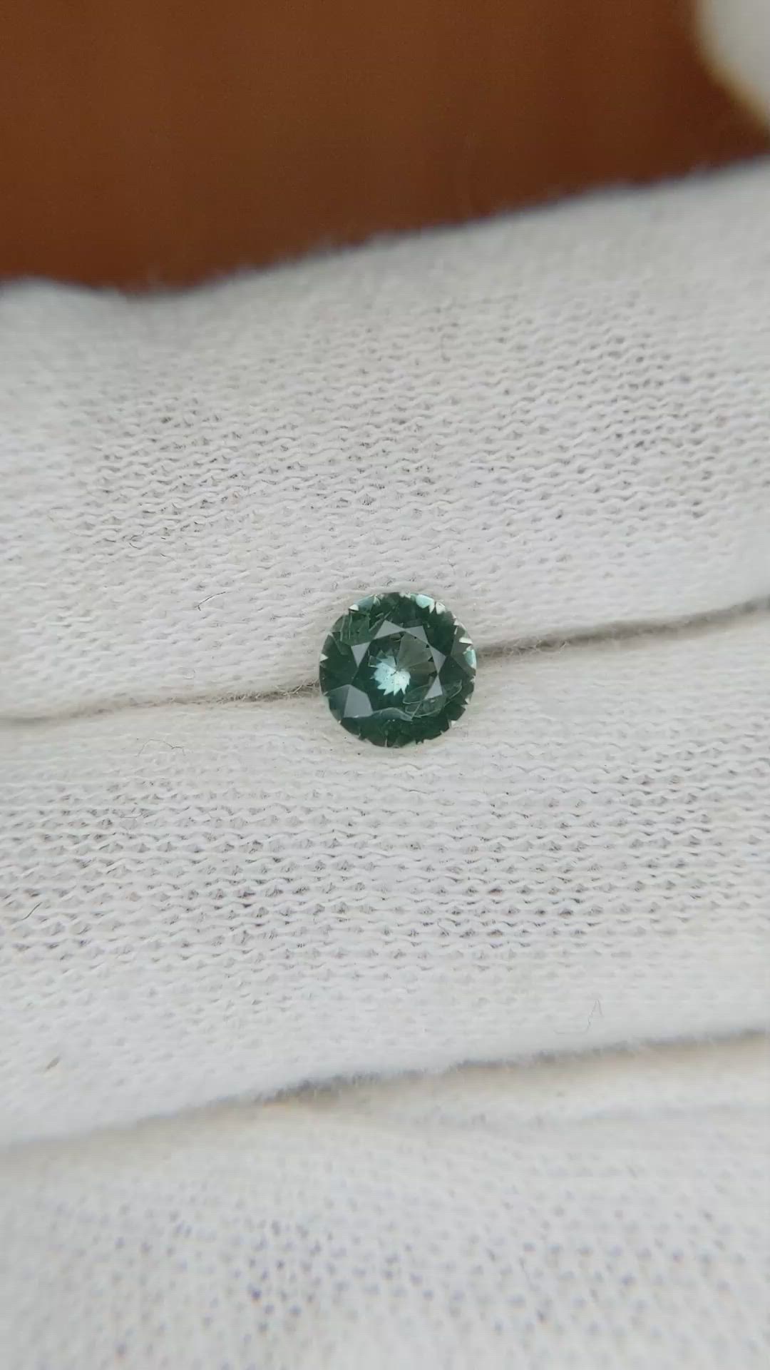 0.74 Ct. Bluish Green Sapphire from Montana Size Video