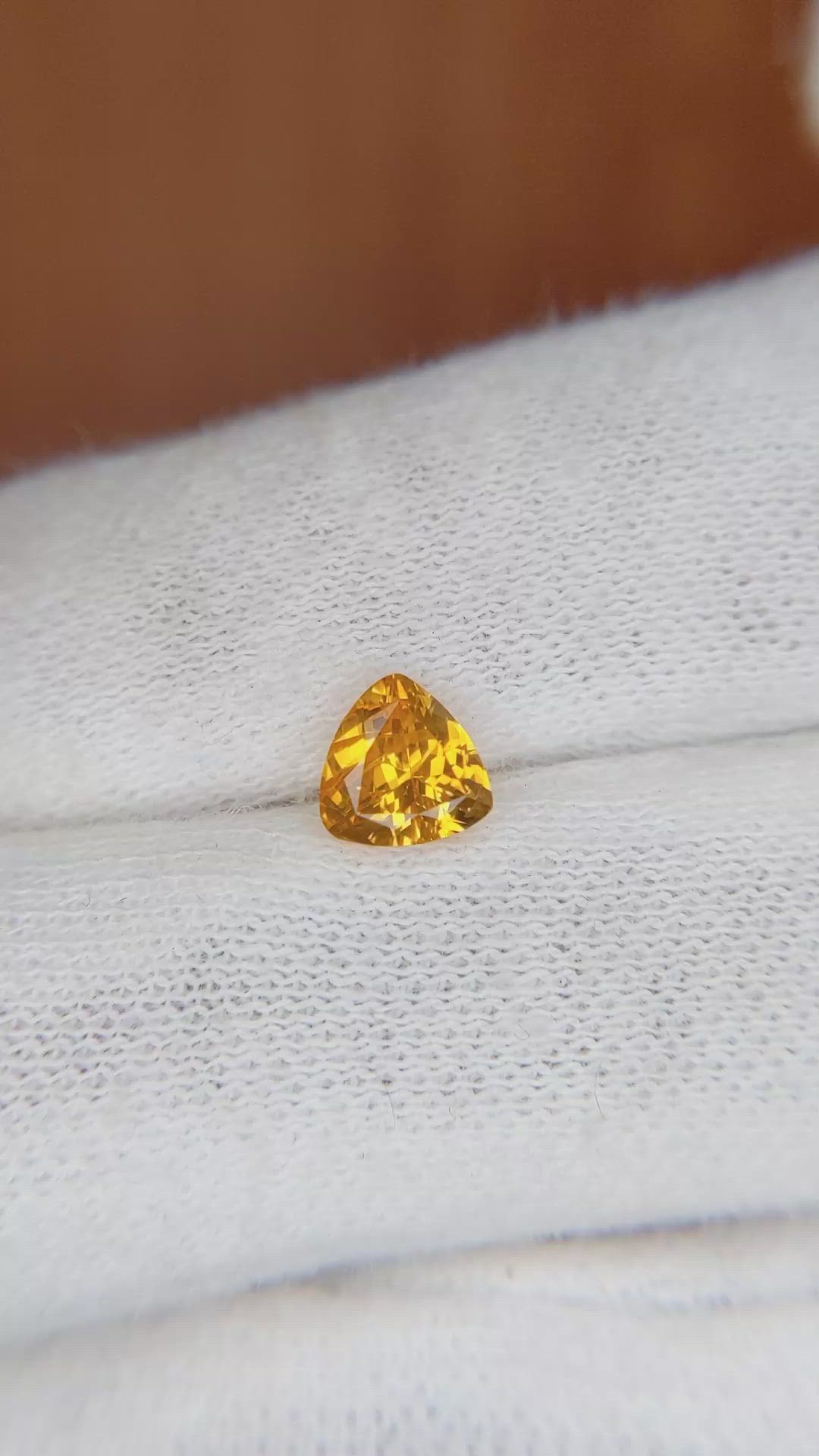 0.73 Ct. Orange Sapphire from Ceylon (Sri Lanka) Size Video