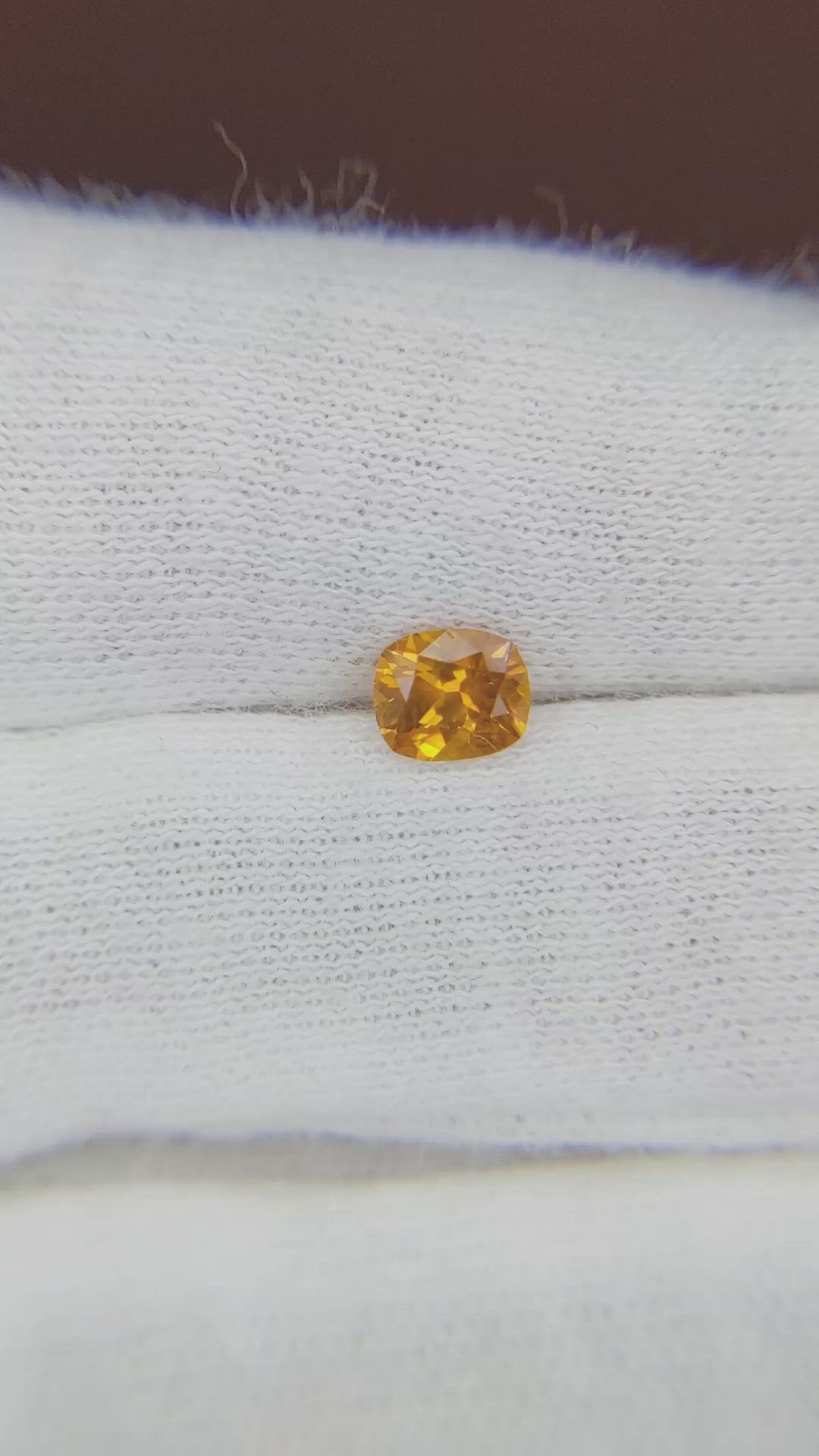 0.60 Ct. Orange Sapphire from Ceylon (Sri Lanka) Size Video