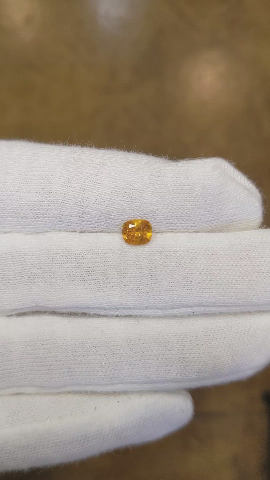 0.60 Ct. Orange Sapphire from Ceylon (Sri Lanka) Size Video