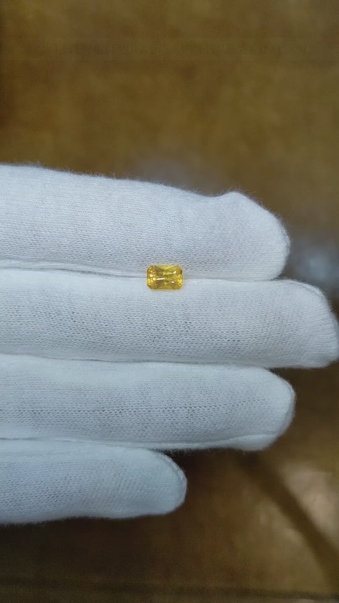 0.68 Ct. Orangish Yellow Sapphire from Ceylon (Sri Lanka) Size Video