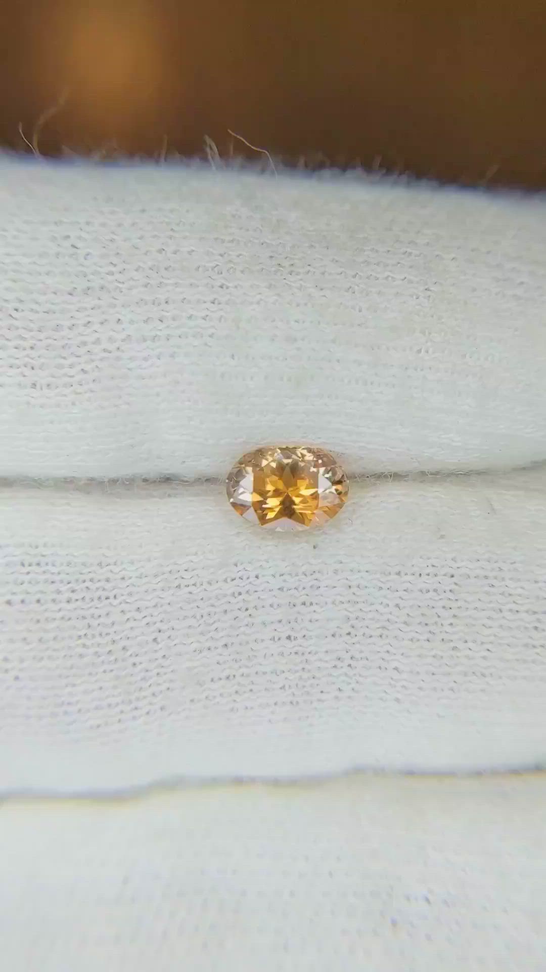 0.59 Ct. Peach Sapphire from Montana Size Video