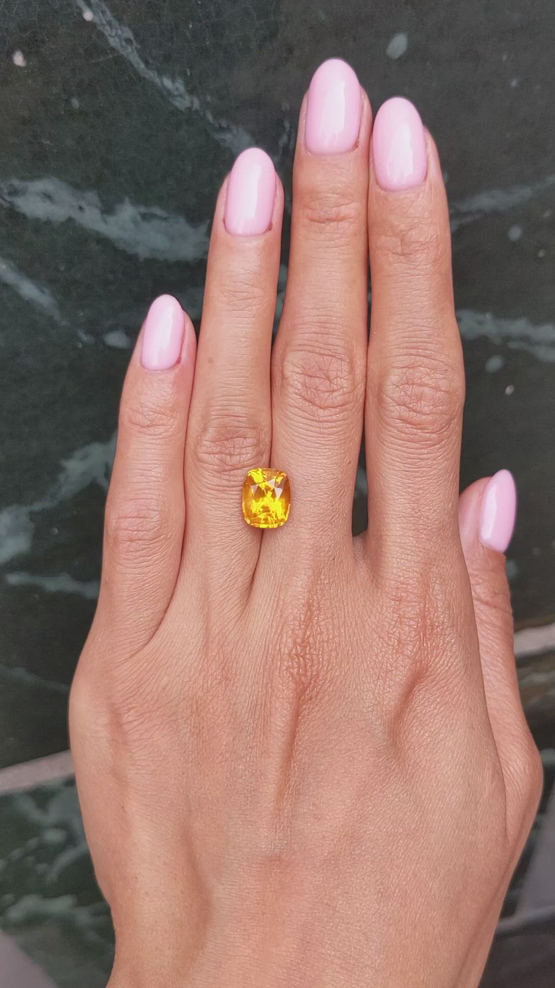 4.93 Ct. Orangish Yellow Sapphire from Ceylon (Sri Lanka) Size Video