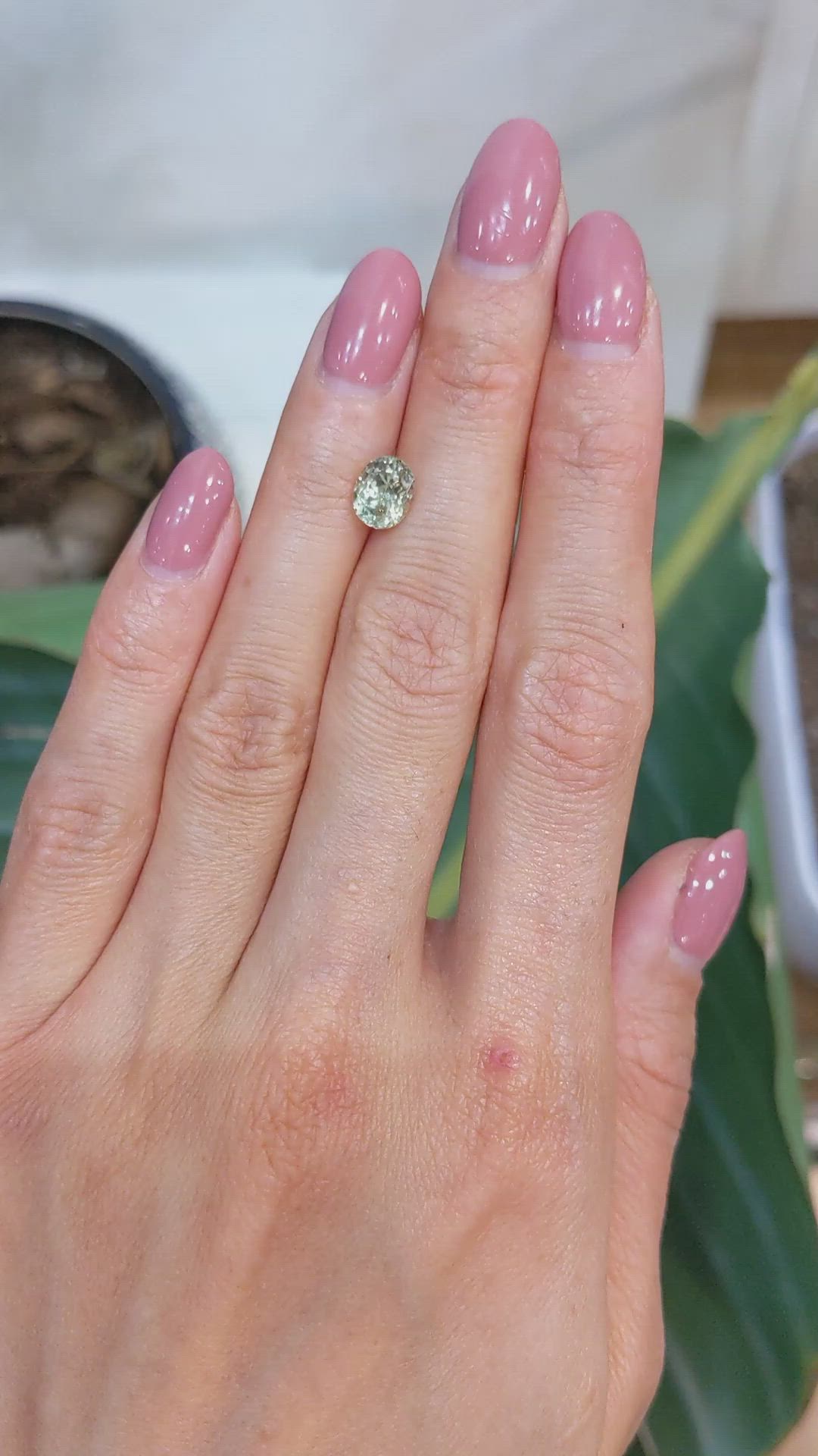 1.50 Ct. Yellowish Green Sapphire from Montana Size Video