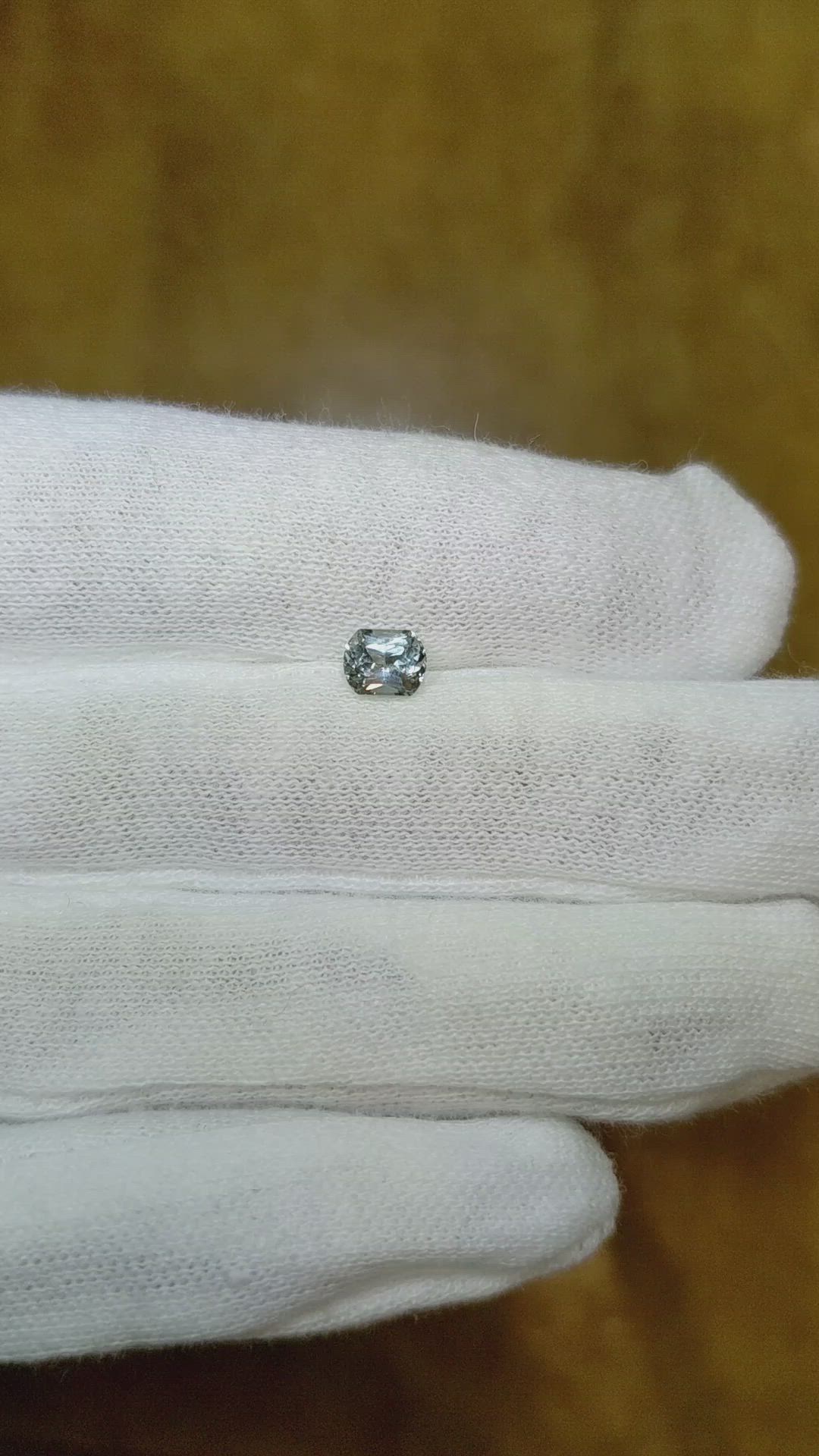 0.62 Ct. Greyish Blue Sapphire from Montana Size Video