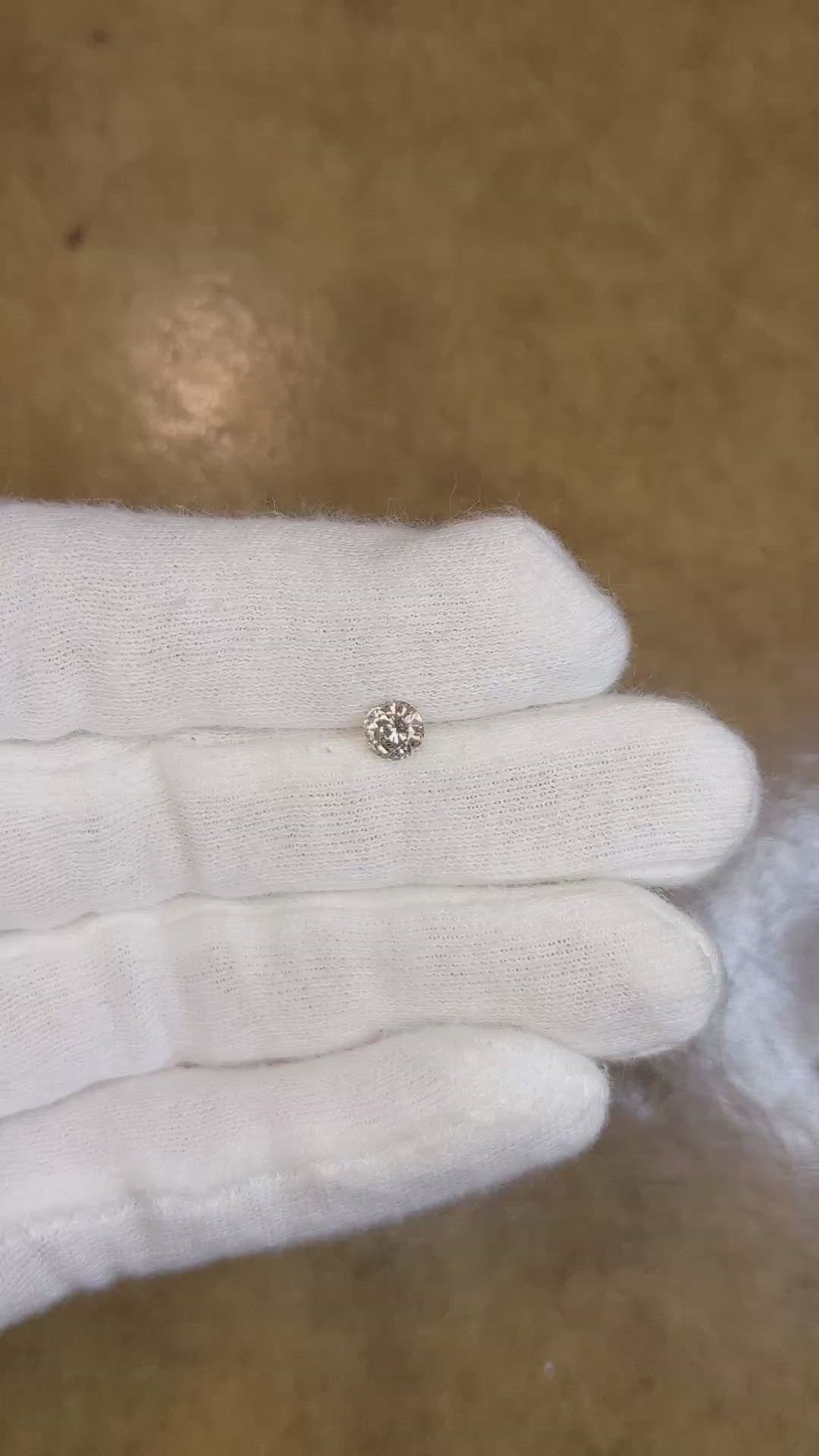 0.68 Ct. Greenish Brown Sapphire from Montana Size Video