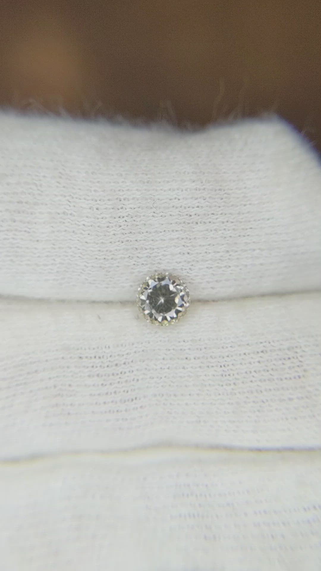 0.68 Ct. Greenish Brown Sapphire from Montana Size Video