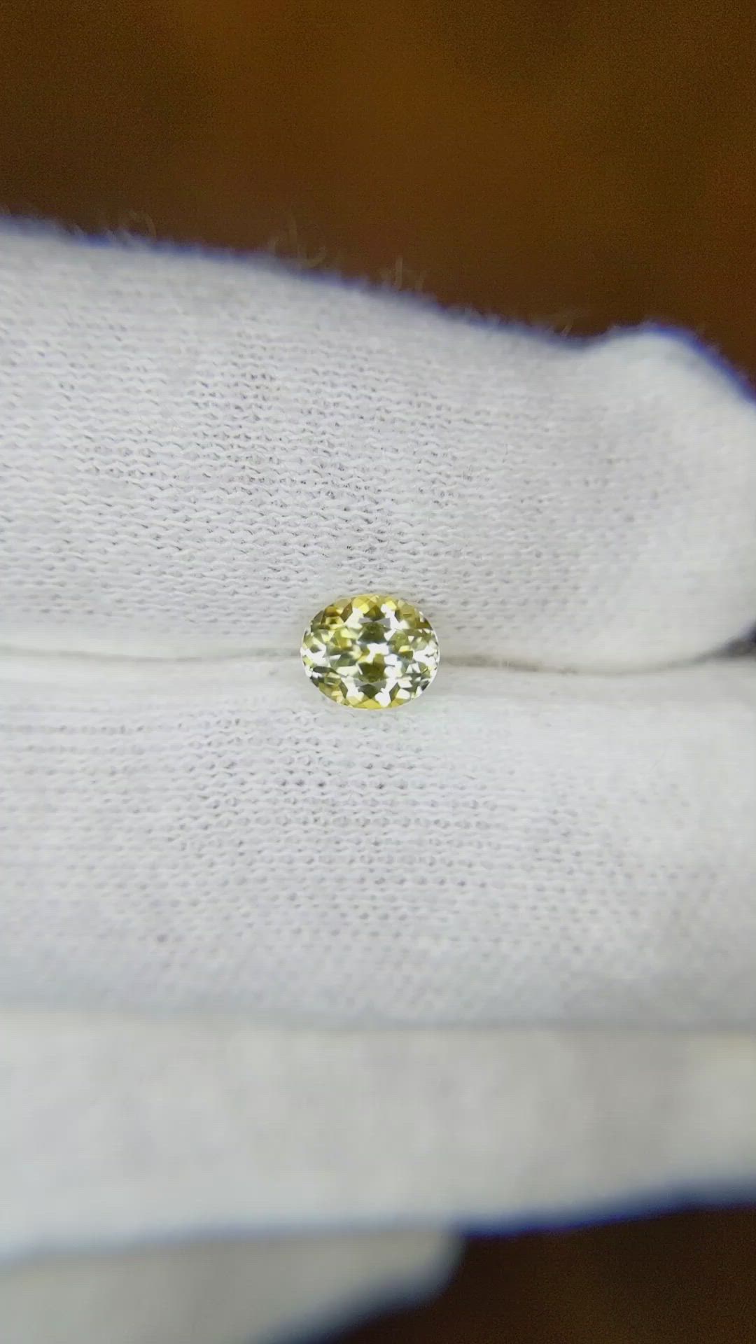 0.62 Ct. Yellow Sapphire from Montana Size Video