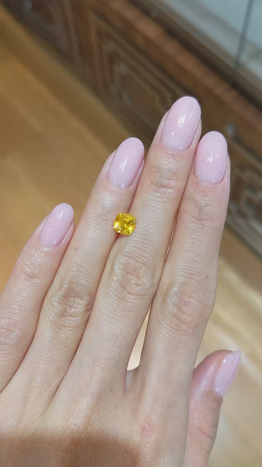 1.31 Ct. Orangish Yellow Sapphire from Ceylon (Sri Lanka) Size Video