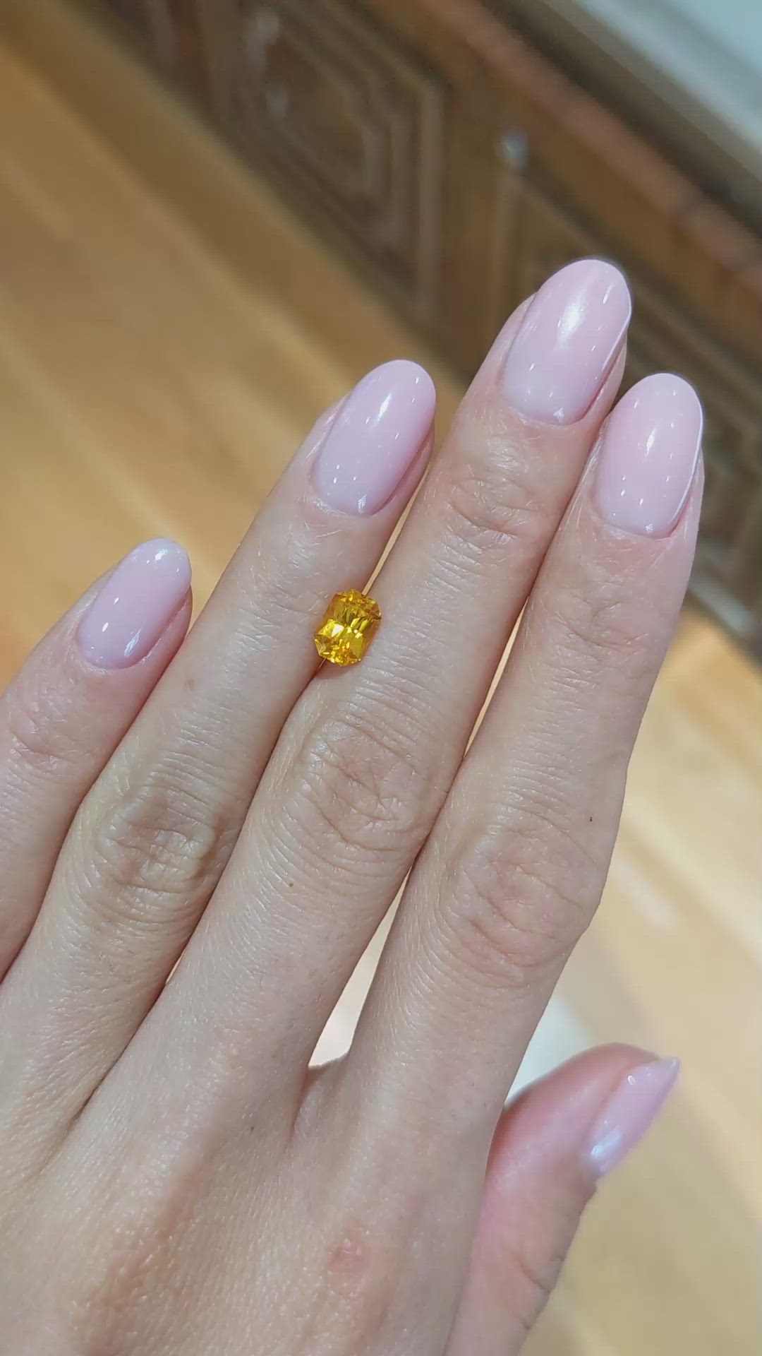 1.31 Ct. Orangish Yellow Sapphire from Ceylon (Sri Lanka) Size Video