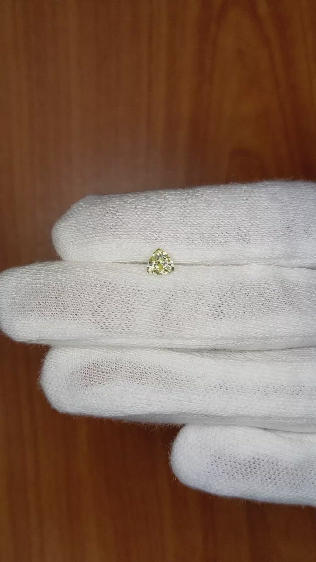 0.62 Ct. Greenish Yellow Sapphire from Ceylon (Sri Lanka) Size Video