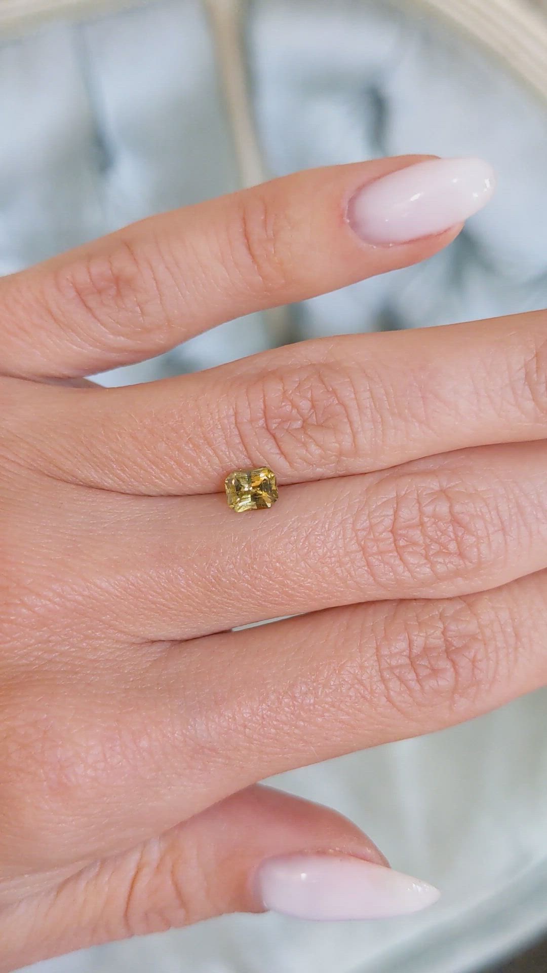 0.71 Ct. Greenish Yellow Sapphire from Ceylon (Sri Lanka) Size Video