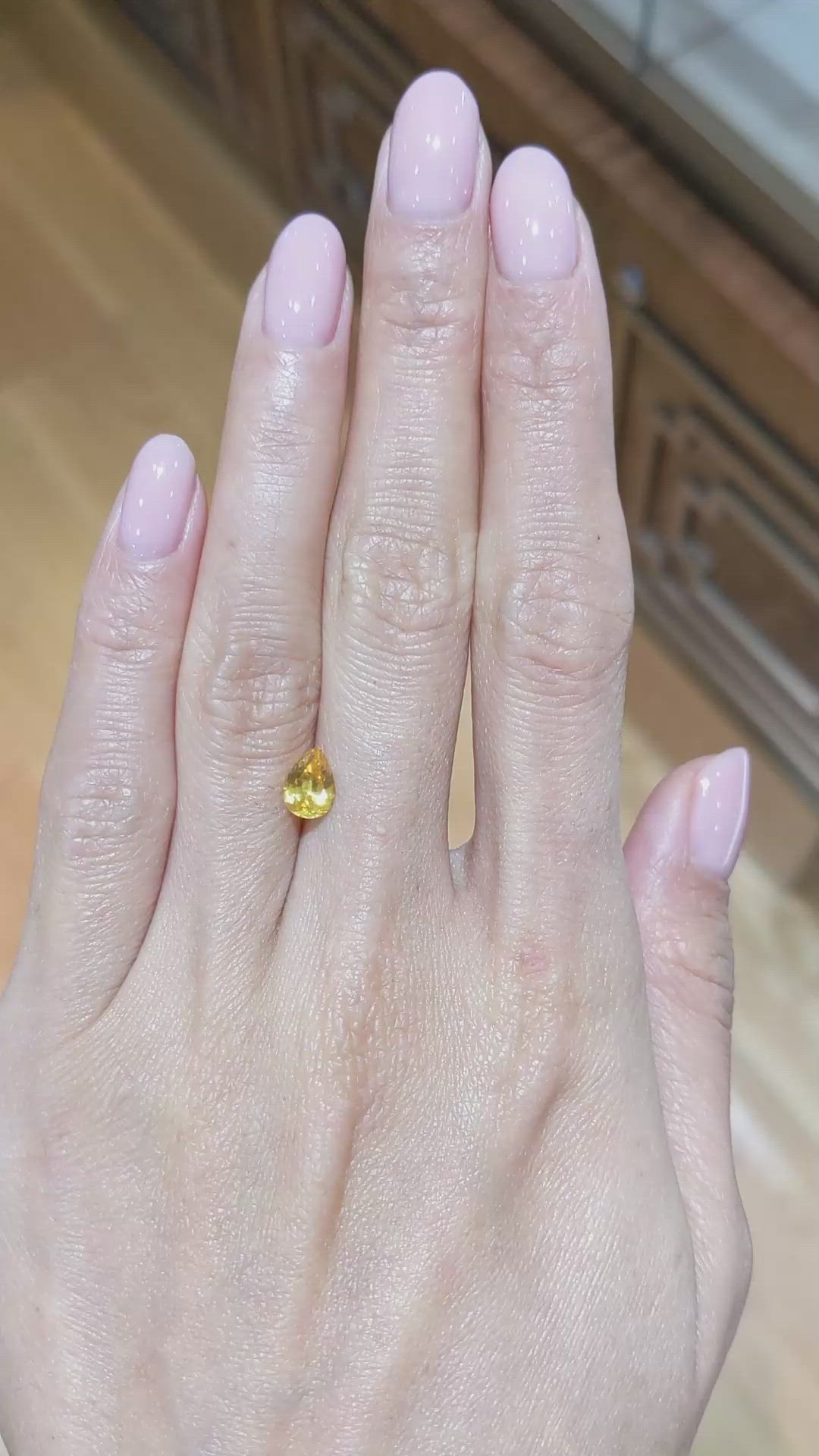 1.04 Ct. Orangish Yellow Sapphire from Ceylon (Sri Lanka) Size Video