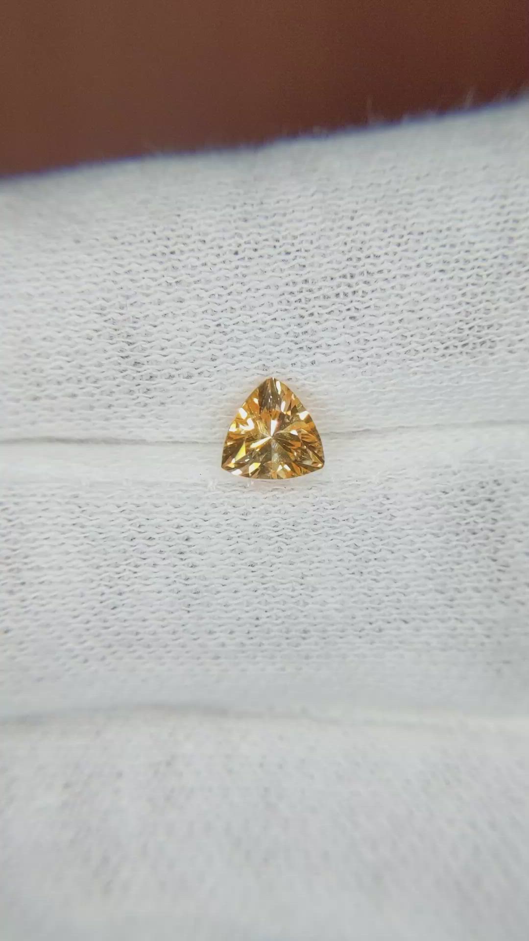 0.67 Ct. Yellowish Orange Sapphire from Ceylon (Sri Lanka) Size Video