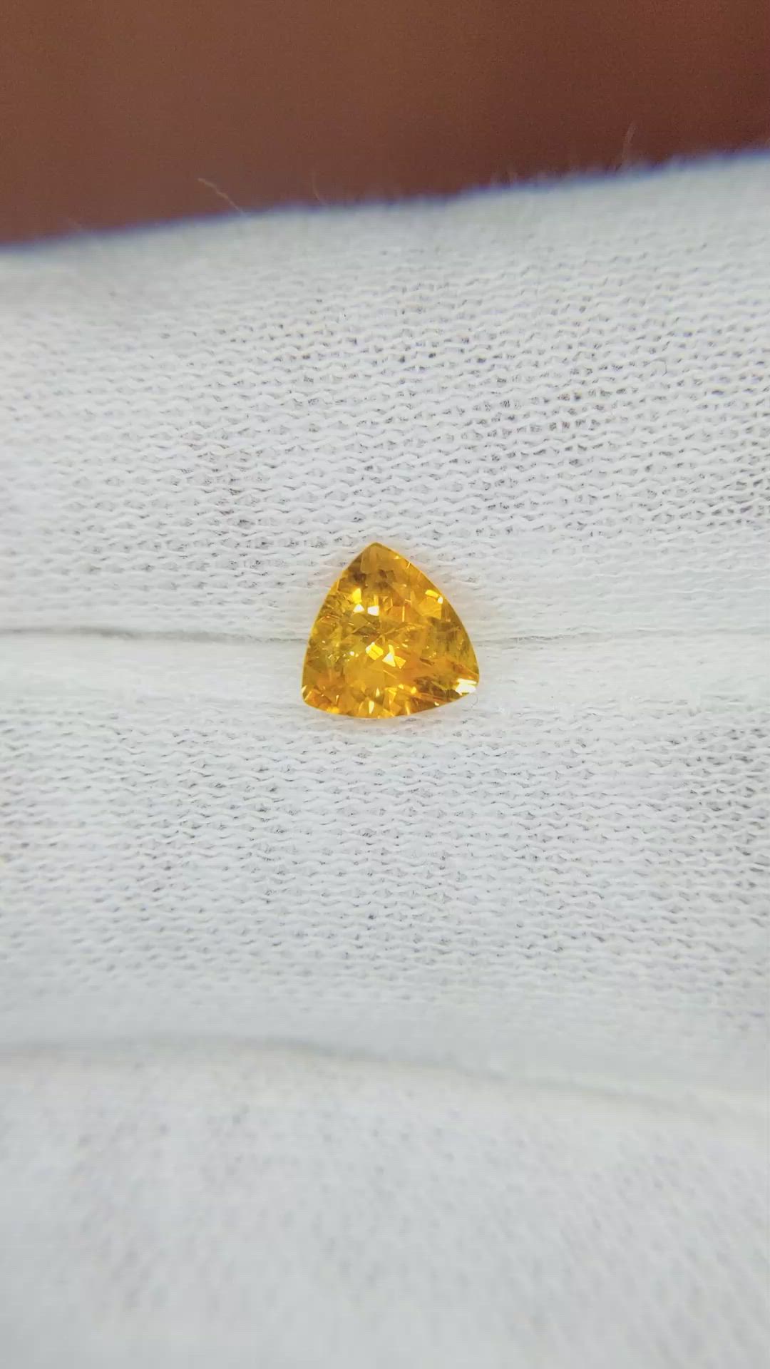 0.79 Ct. Orangish Yellow Sapphire from Ceylon (Sri Lanka) Size Video