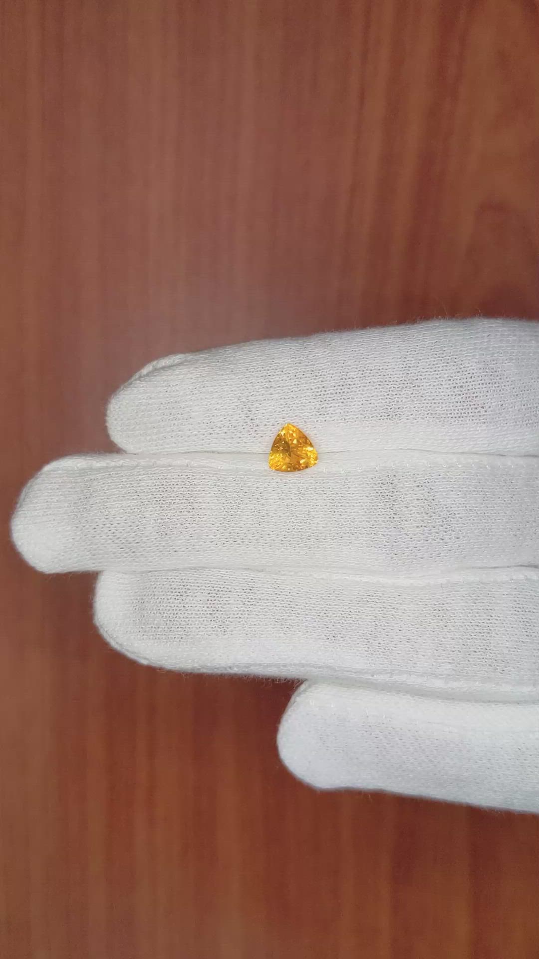 0.79 Ct. Orangish Yellow Sapphire from Ceylon (Sri Lanka) Size Video
