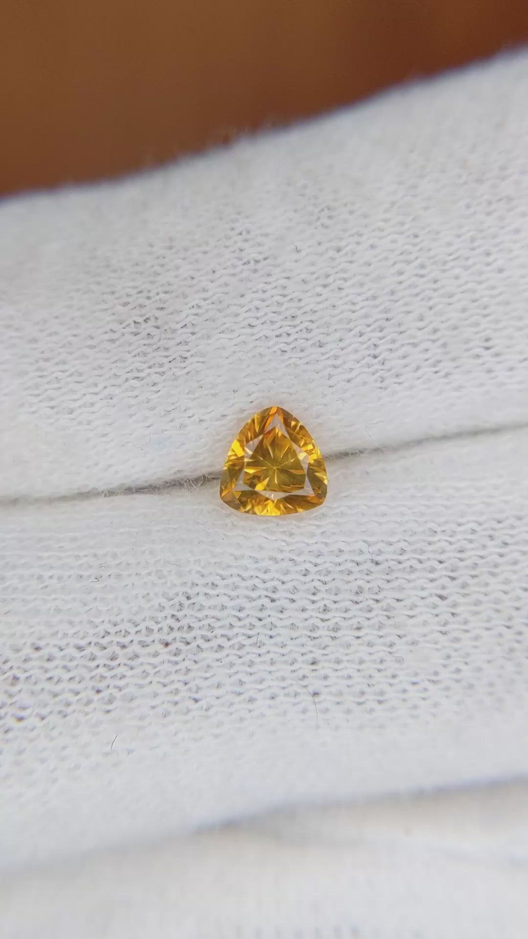 0.58 Ct. Yellowish Orange Sapphire from Ceylon (Sri Lanka) Size Video