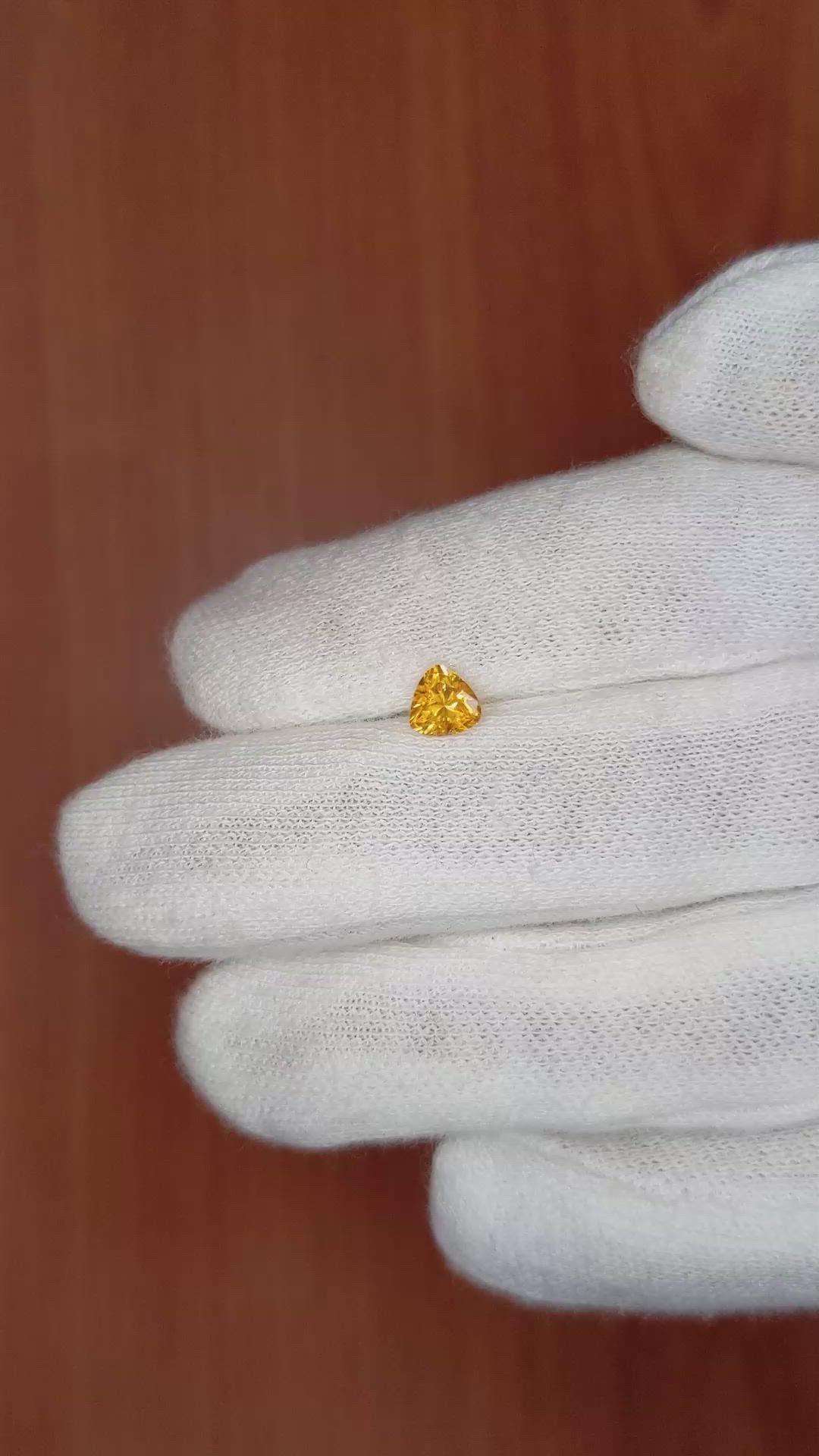 0.58 Ct. Yellowish Orange Sapphire from Ceylon (Sri Lanka) Size Video
