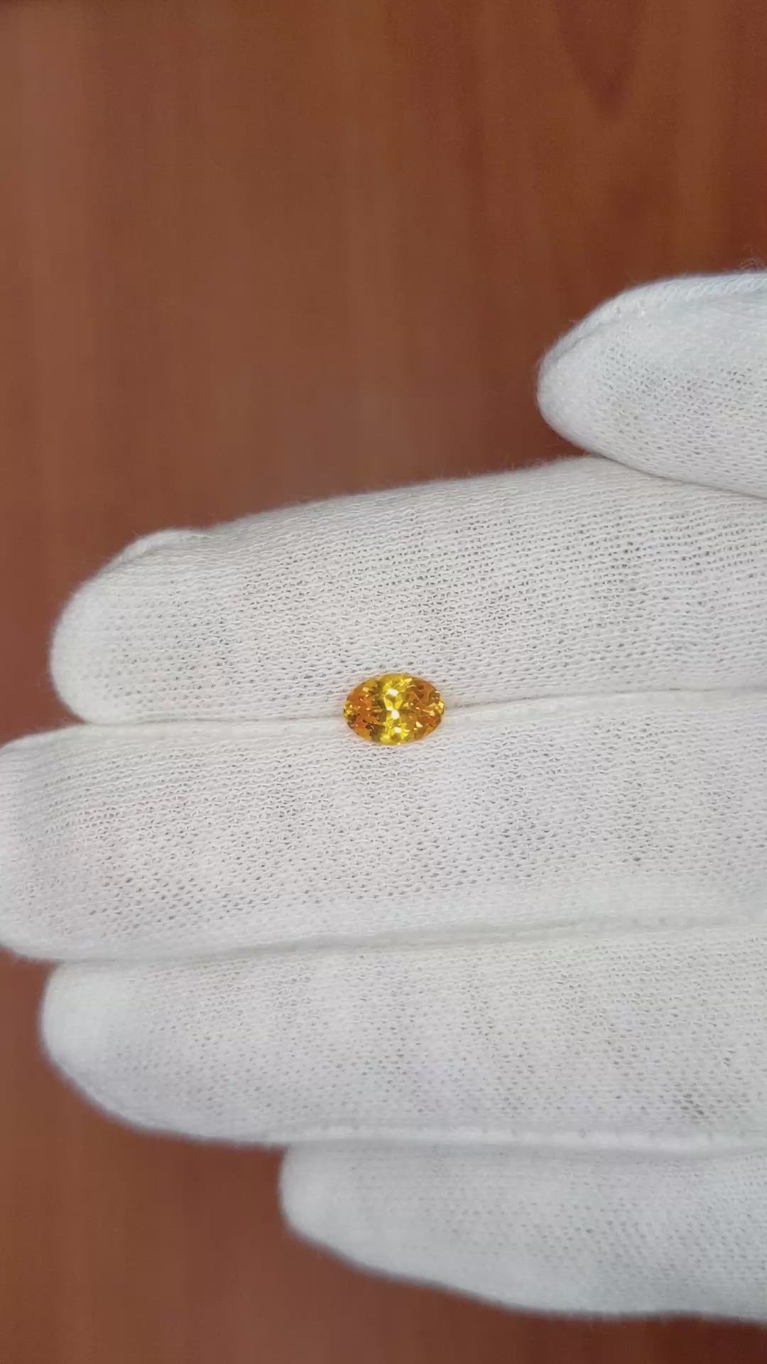 0.88 Ct. Orangish Yellow Sapphire from Ceylon (Sri Lanka) Size Video